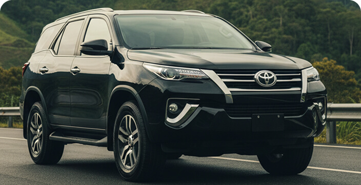 SUV Premium with generous space and tinted windows.