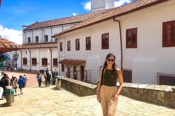 Walking a colonial street in Bogota old town on the layover tour