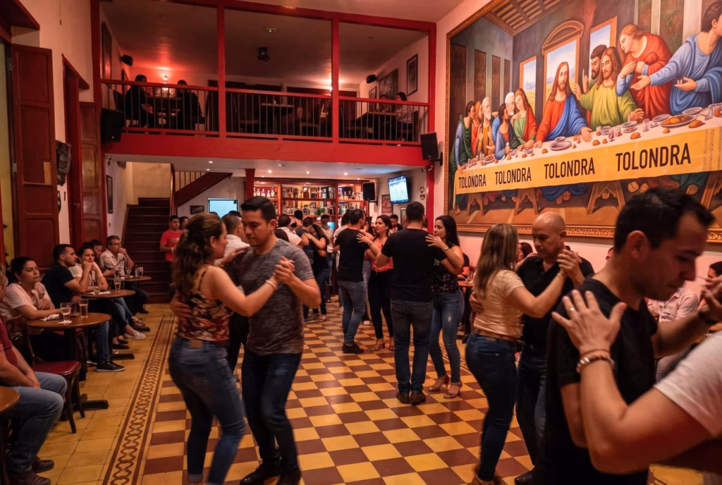 Couples dancing salsa in a club in Cali