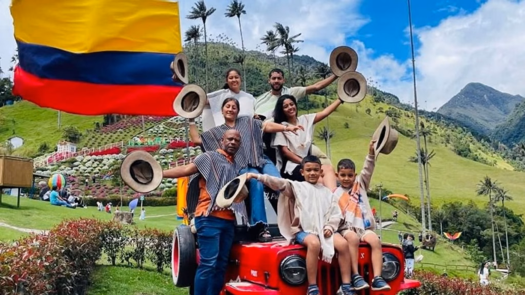 A family posing on a Willys jeep near the Cocora Valley